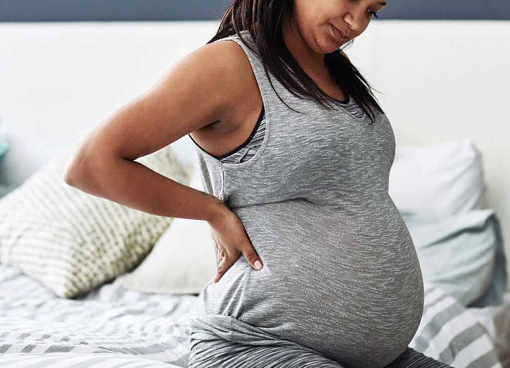 چرا در دوران بارداری کمردرد بروز می‌کند؟


